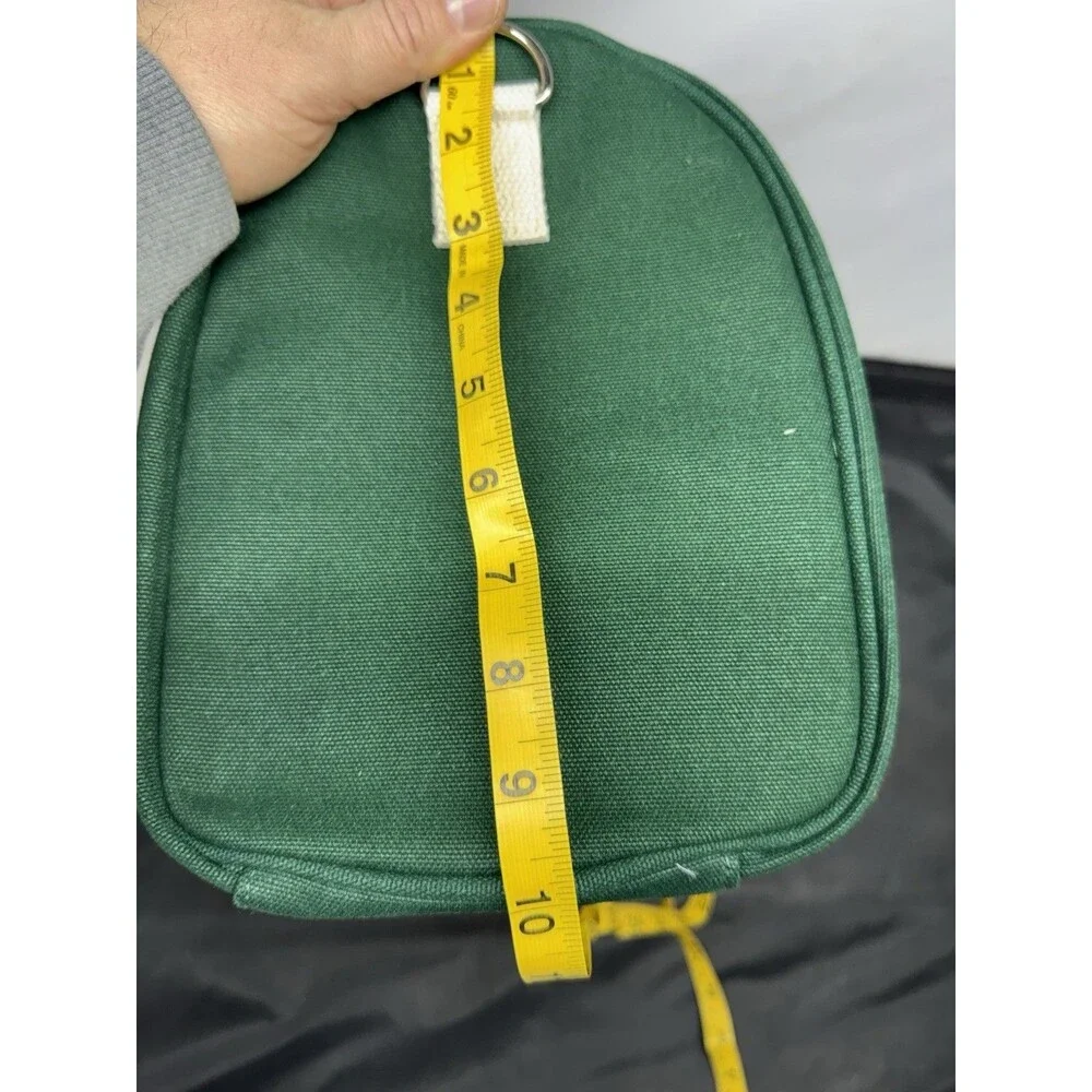AG1 Duffle Bag Unisex Green Canvas White Handles Accents Adjustable Strap NWOT